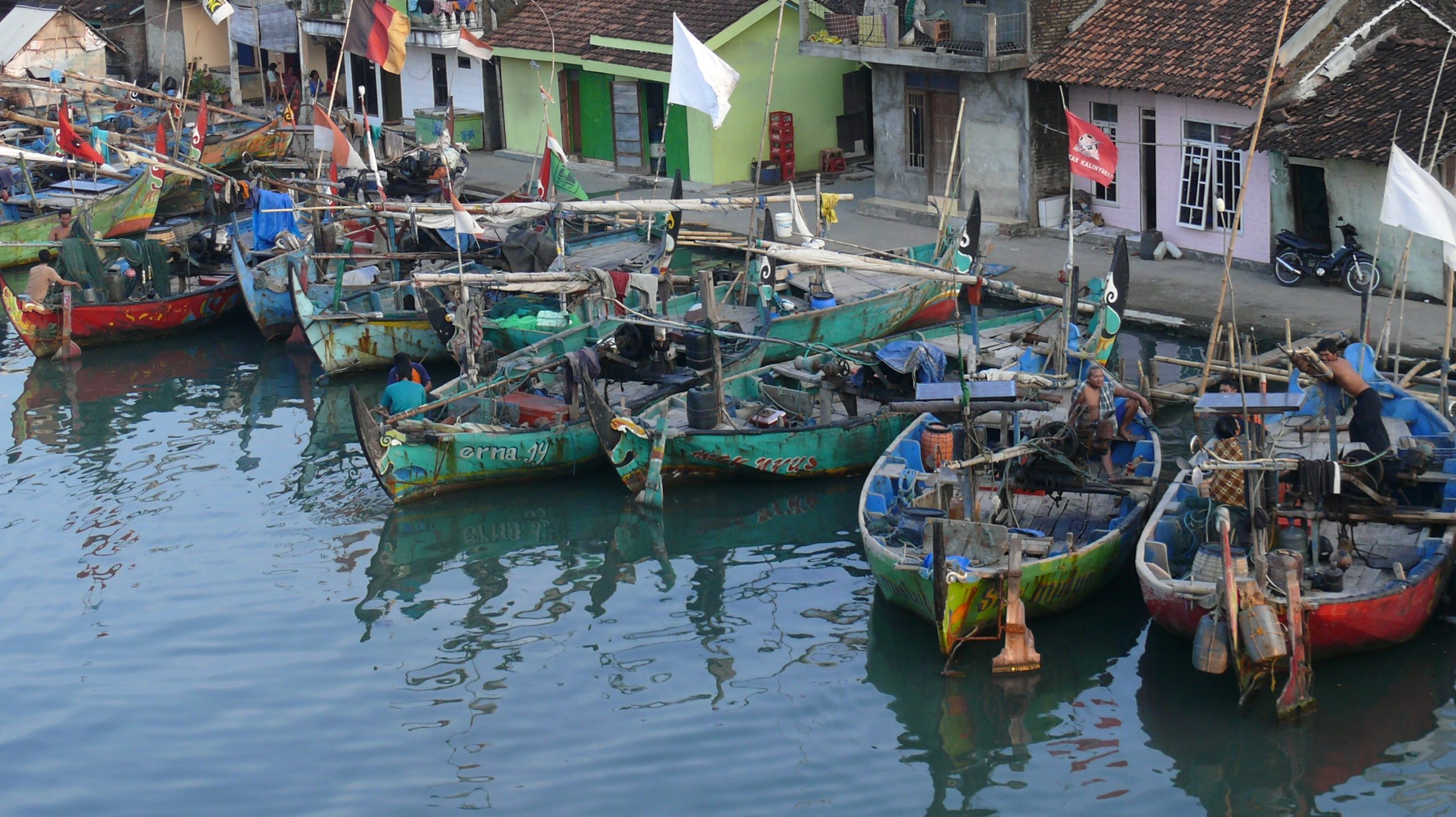 Boats moored in a fishing village