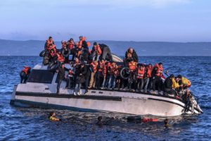 Syrians and Iraq refugees arrive at Skala Sykamias Levos, Greece