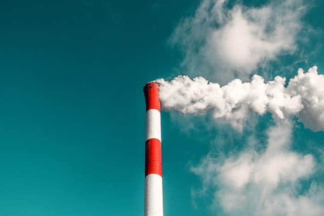 Photo of a smokestack by veeterzy on Unsplash